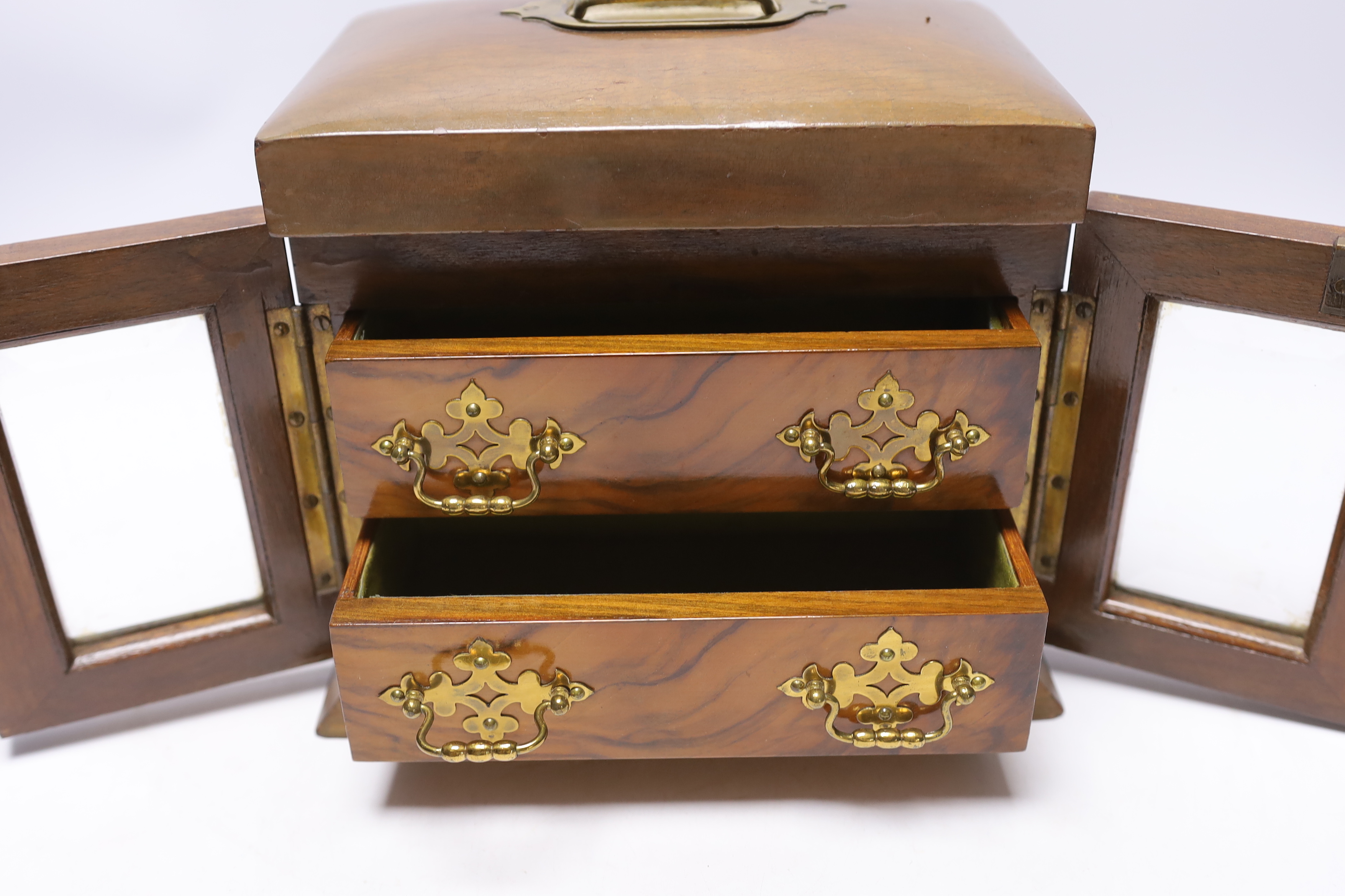 A Victorian walnut two drawer and two glazed door jewellery cabinet, 25cm wide x 20cm high